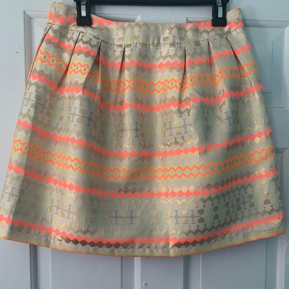 Geometric gold mini skirt